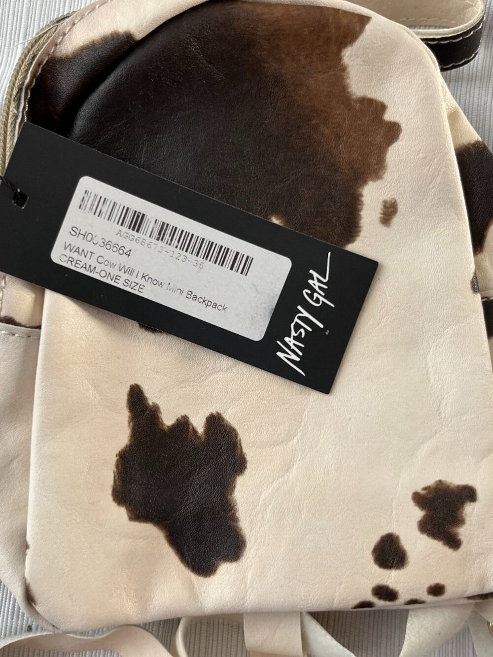 Nasty Gal Small Faux Leather Backpack Beige/Brown Animal Print Cow